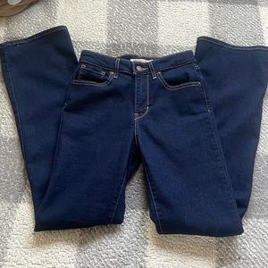 Levi’s dark blue boot cut jeans